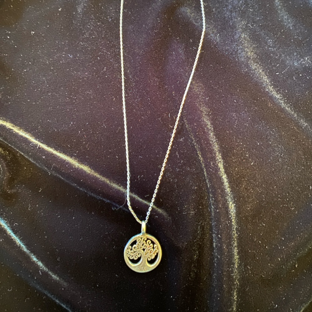 Fair trade tree necklace.